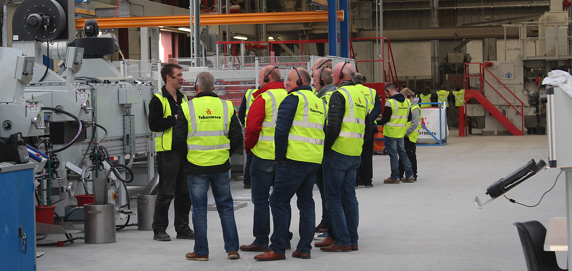 Visitors using tour guide system for site tour